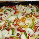 Putenwanne mit Gemüse und Speck