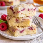 Himbeer-Mandel-Krümelriegel mit frischen Himbeeren und Mandeln für einen gesunden Snack