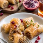 Brie und Prosciutto Rollen, idealer Snack für Feiern und Buffet.