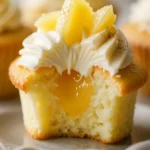 Ananas-Frischkäse-Cupcakes mit köstlicher Cremehaube