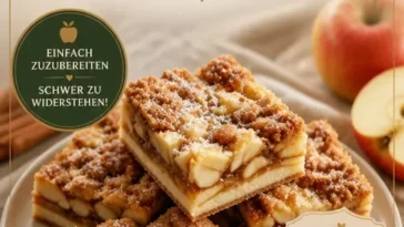 Glutenfreie Apfelkuchenriegel auf einem Teller, frisch gebacken und serviert.