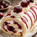 Himmlischer Kirsch-Cheesecake-Rollkuchen mit frischen Kirschen und Käsekuchenfüllung